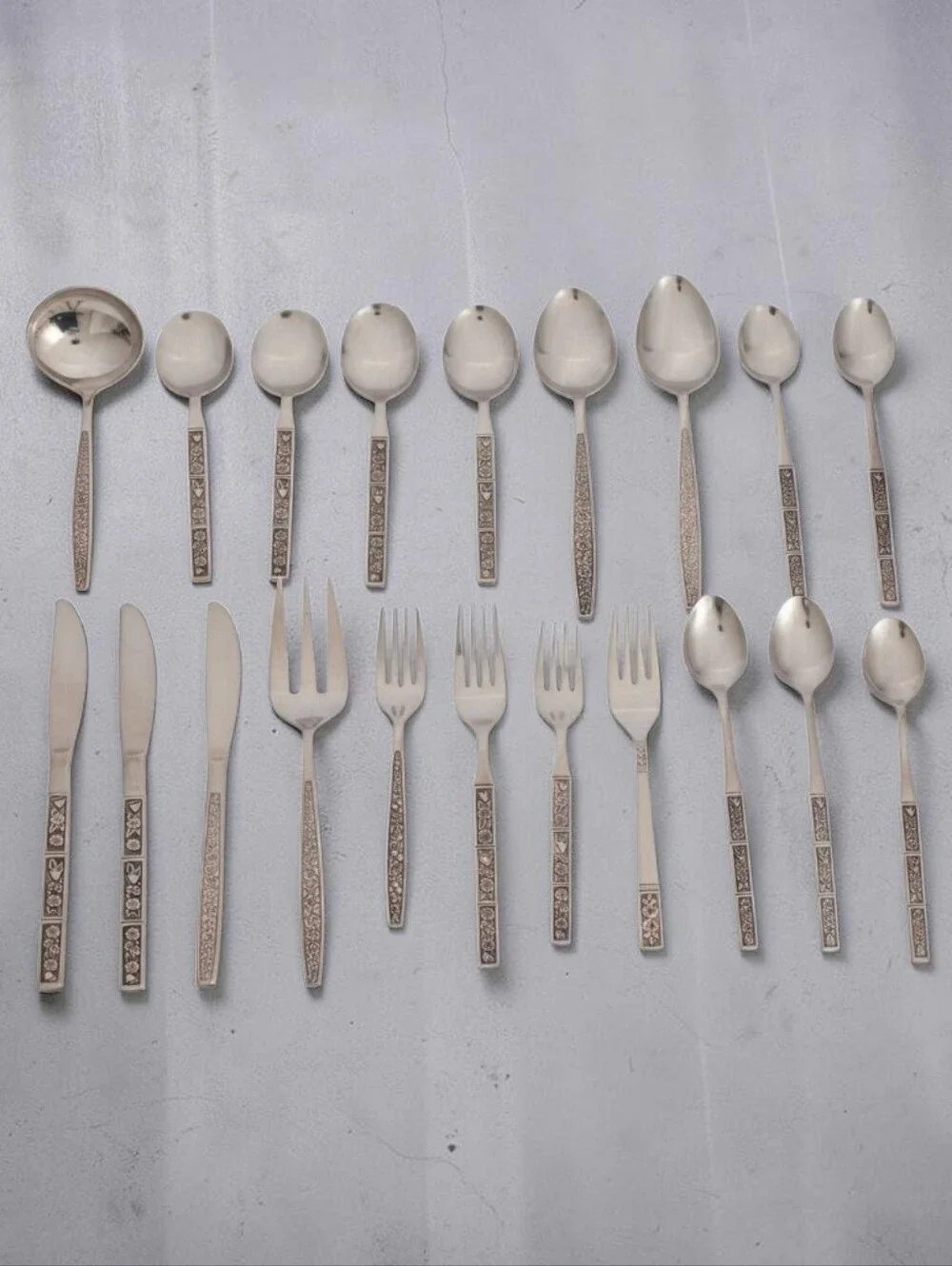 (Lot Of 20) Assorted Oneida Northland Spring Fever Stainless Steel Flatware Set.
